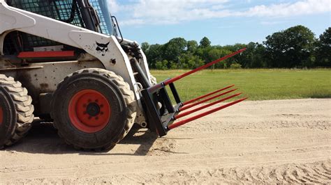 skid steer fork round bale spear|round bale hay fork attachment.